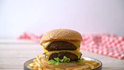 Double Cheeseburger with Fries on Plate