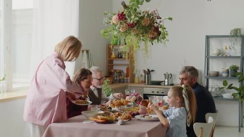 Family Gathering for Easter Meal in Bright Kitchen