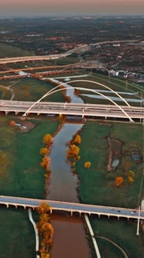 Aerial view of Dallas showcasing urban bridges and waterways