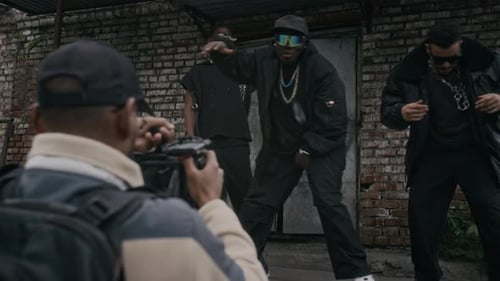 Young Men Dancing in Front of Cameraman