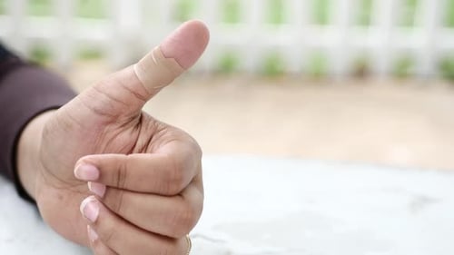 Adhesive Bandage on Hand Close Up