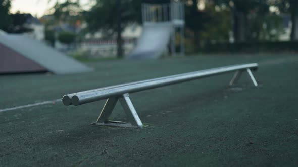 Metal railings in skate park. Skatepark fixtures and fittings. Handheld ...