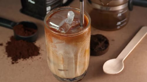 Cold Coffee Drink Mixing on a Neutral Surface