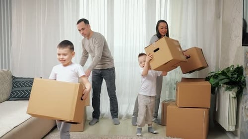 Happy Family Moving Into a New Home