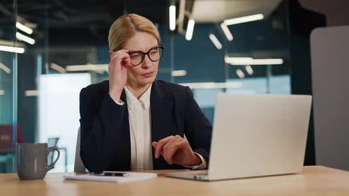 Woman Typing, Taking Off Glasses, Eye Strain