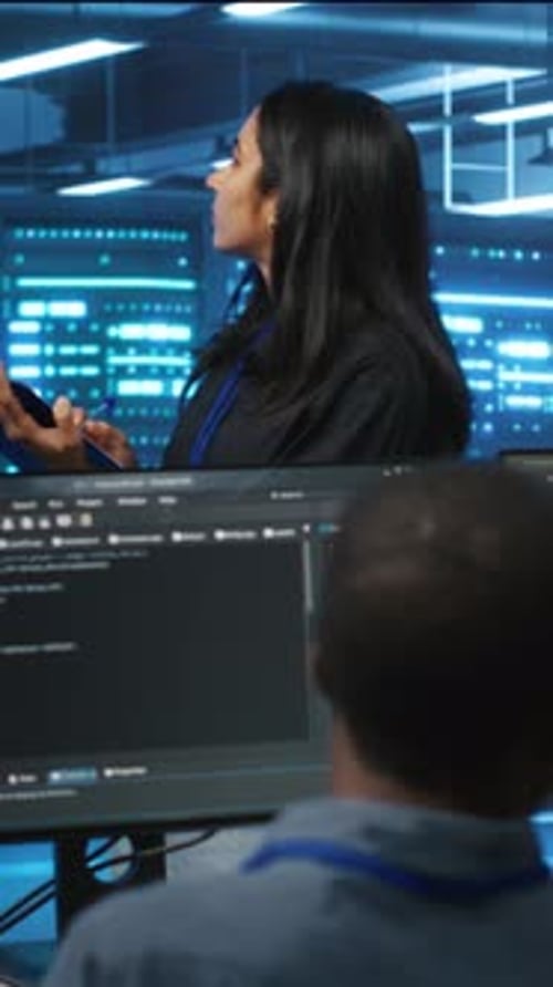 Vertical Video Supervisor Doing Inspection in Server Hub Monitoring Energy Consumption