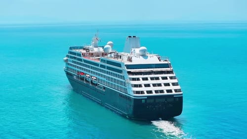 Luxury Cruise Ship Sailing on Turquoise Ocean Waters