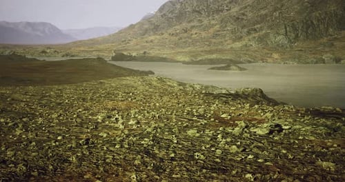 Alien Landscape with Rocky Terrain and Distant Mountains Under Haze