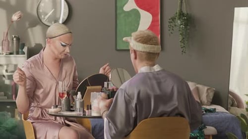 Queer Men Chatting while Applying Makeup at Home