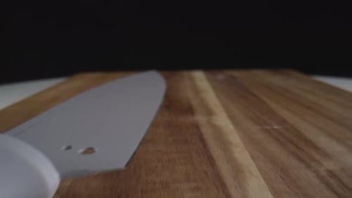 Kitchen Knife on Wooden Cutting Board