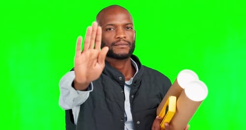 Portrait, stop and hand gesture with a black man construction worker on green screen in studio