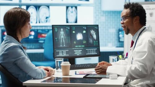 Doctor Discussing Diagnosis with Patient in Medical Office