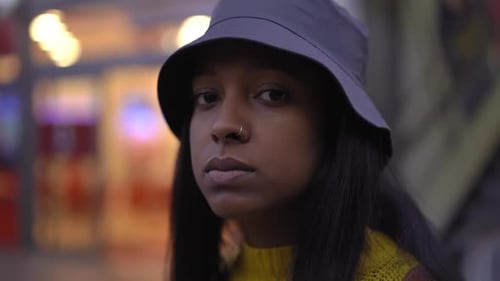 Portrait of Empowered Woman Looking at Camera with Determination and Pride