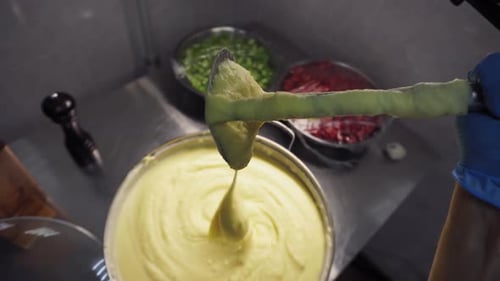 Mashed Potatoes Being Prepared in a Commercial Kitchen