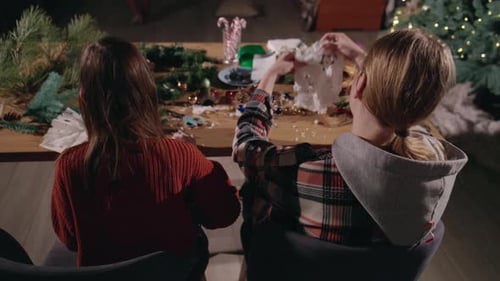 Girls Crafting Festive Christmas Decorations at Home