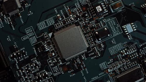 Focus on a Microchip, CPU Processor. Black Printed Circuit Board, Computer Motherboard with Compone