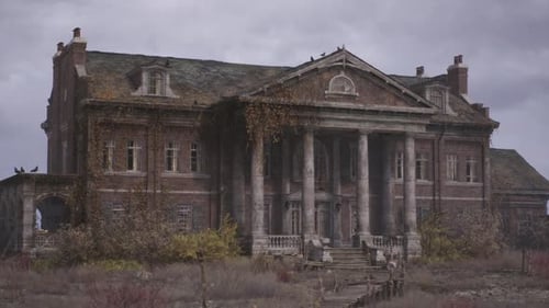 Abandoned Old Mansion with Overgrown Vines and Cloudy Sky