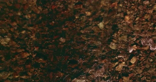 Low Altitude Flight Over Fresh Fast Mountain River with Rocks at Sunny Summer Morning