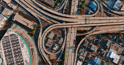 Highways, loops and freeways with multiple transport moving of Los Angeles, California, USA.