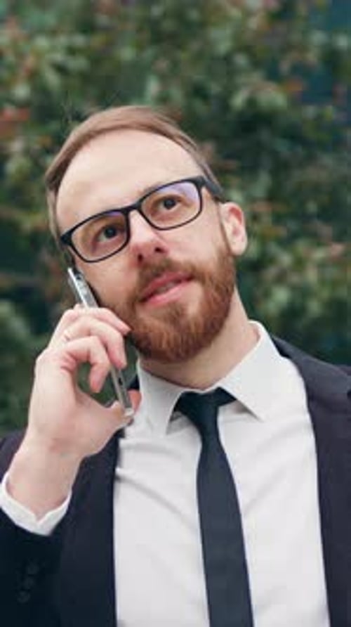 Business Man Phone Call and Walking in City for Conversation Mobile Networking and Urban Consulting