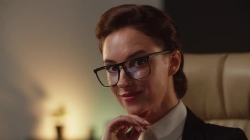 Confident Woman in Business Suit Smiles