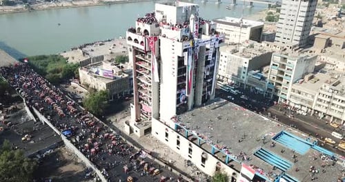 Aerial View of Large Crowd in Urban Setting
