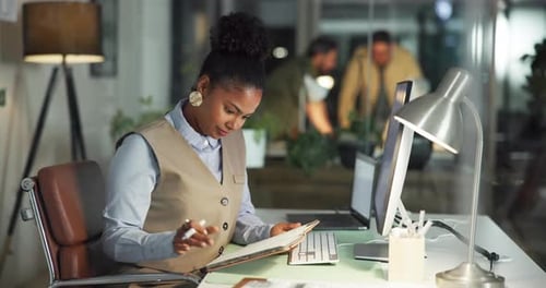 Computer, woman and writing in notebook in office for article notes, planning story