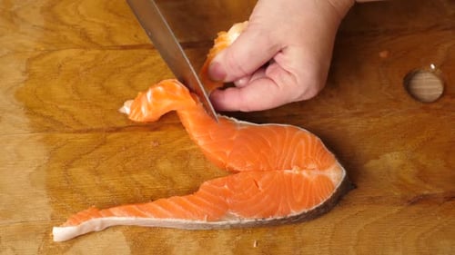 22. When cooking salmon, the skin is cut off