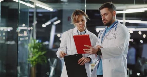 Medical Professionals Collaborate in Modern Office Environment