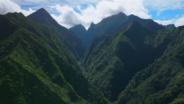 Towering mountain volcano peaks valley Teahupoo Tahiti French Polynesia ...