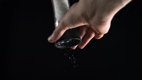 Salt Mill on a Black Background 2K