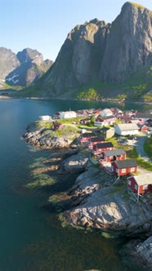 Explore the Breathtaking Coastal Village of Norway Nestled Between Mountains and Sea