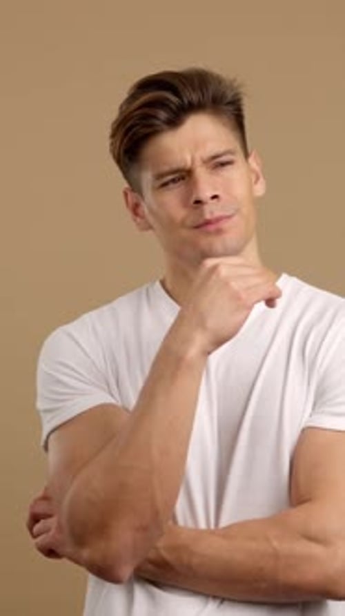 Man Thinking and Looking Off-Camera