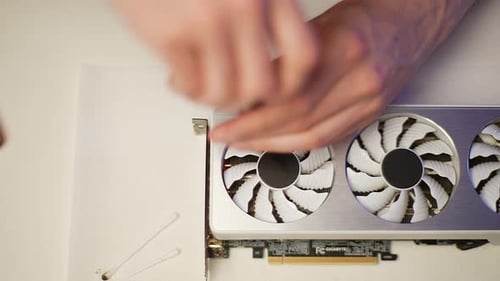 Highangle View of Technician Male Working in Workshop or Hardware Computer Service Assembling Video