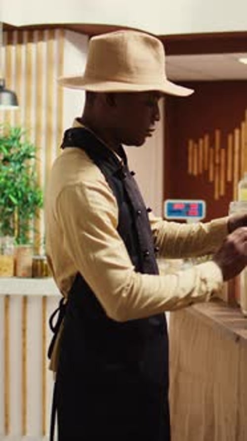 Vertical Video African American Seller Preparing Local Farmers Market Products
