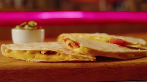 Close Up of Cheese Quesadilla Eating Traditional Mexican Food Tex Mex Cuisine