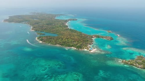 Drone view of Isla Grande in Rosario Islands, Colombia, surrounded by crystal clear Caribbean