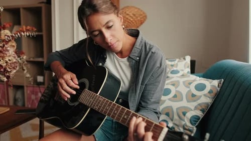 Woman Plays Guitar in Living Room, Acoustic Music