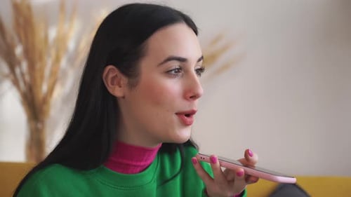 Young Adult Woman Talking on Mobile Phone Close Up