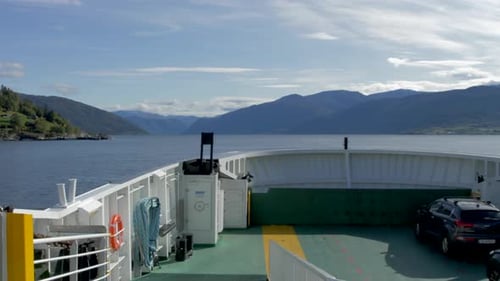 Pan of a Fjord in Norway from on Board a Ferry on a Beautiful Sunny Day