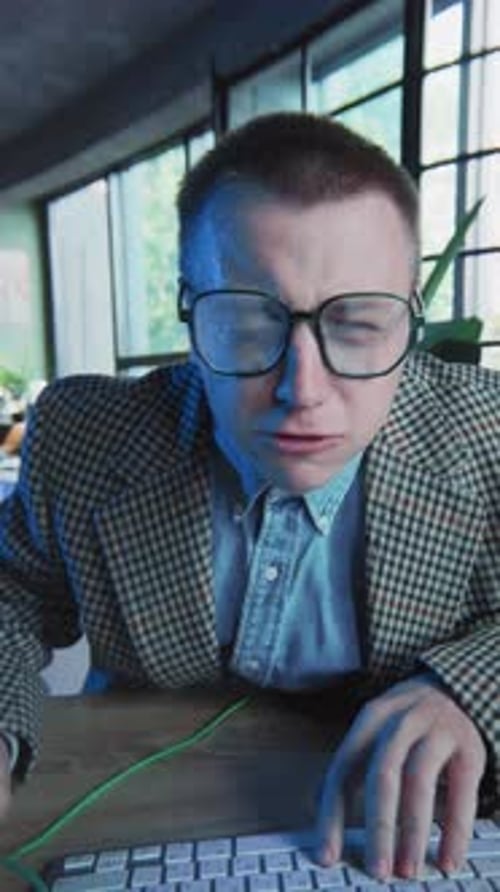 Close Up Face Emotional Guy Removes Glasses Use Computer Typing on Keyboard Look on Screen Geek