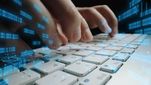 Hands Typing on Keyboard Surrounded by Digital Graphs and Data Visualizations Representing Technolog