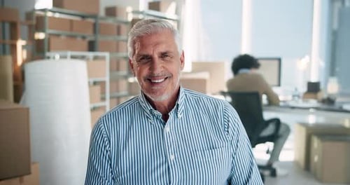 Smiling Mature Man in Office Setting