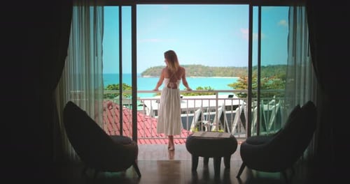 Young Woman Stand on Balcony Enjoy Ocean View
