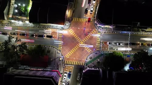 Aerial look down the car traffic at cross junction