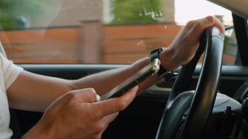 Driver Using Smartphone While Driving Car Unsafe Distracted Driving