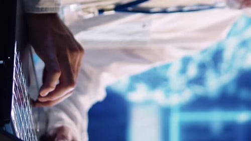 Doctor in wheelchair seated in hospital environment