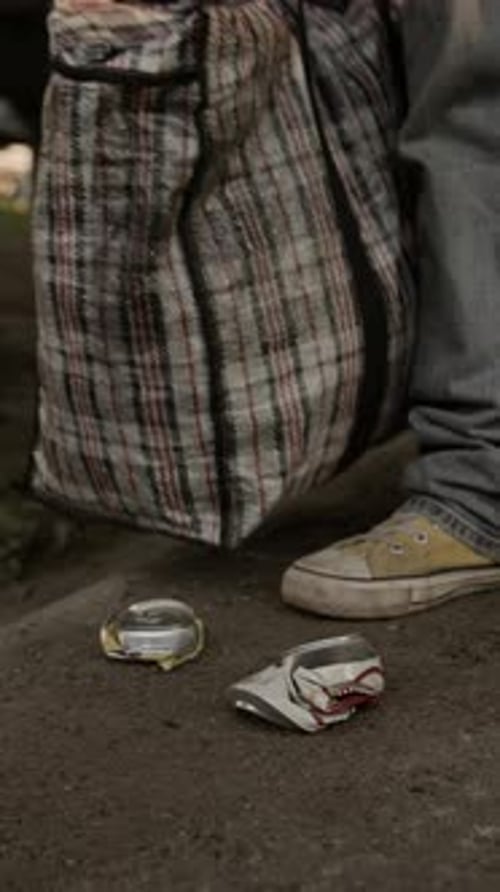 Crushing a Can with a Shoe Outdoors