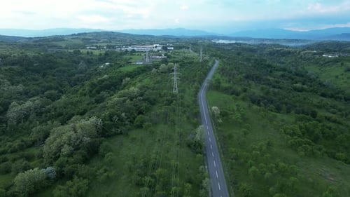Aerial View of Road Through Green Landscape
