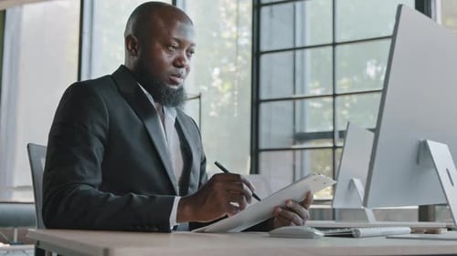 Senior Businessman African American Righthanded Employee Designer Sit in Office Look at Computer